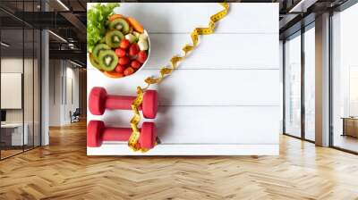 Diet Healthy food and lifestyle health concept. Sport exercise equipment workout  gym background with nutrition detox salad for fitness style.  Wall mural